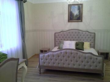 Фото номера Семейный люкс Загородные дома Meždzirnas Country House &amp; SPA г. Кабиле 4