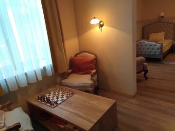 Фото номера Семейный суперлюкс Загородные дома Meždzirnas Country House &amp; SPA г. Кабиле 3
