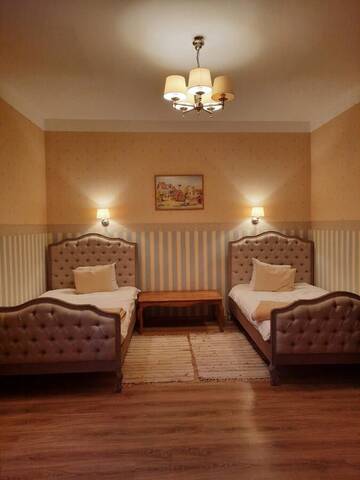 Фото номера Семейный суперлюкс Загородные дома Meždzirnas Country House &amp; SPA г. Кабиле 4